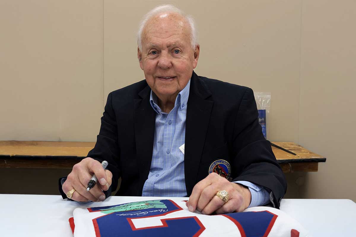 Yvan Cournoyer signing autographs at the Collectors Supershow at the International Centre in Toronto, Ontario, February 2026