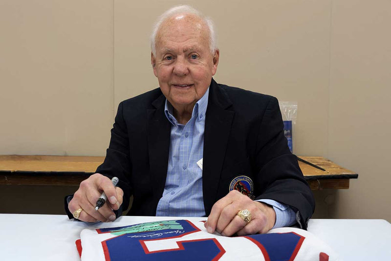 Yvan Cournoyer signing autographs at the Collectors Supershow at the International Centre in Toronto, Ontario, February 2026