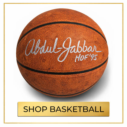 Autographed basketball memorabilia collection featuring signed basketball collectibles