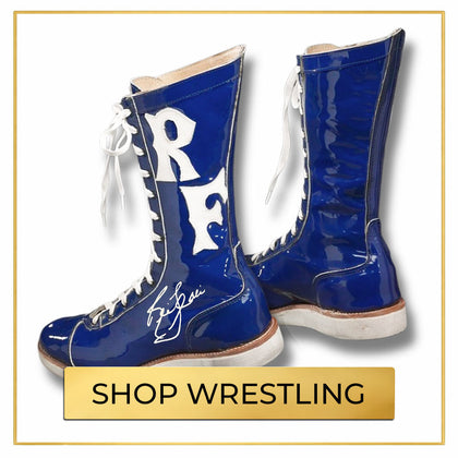Autographed wrestling memorabilia collection featuring signed wrestling collectibles