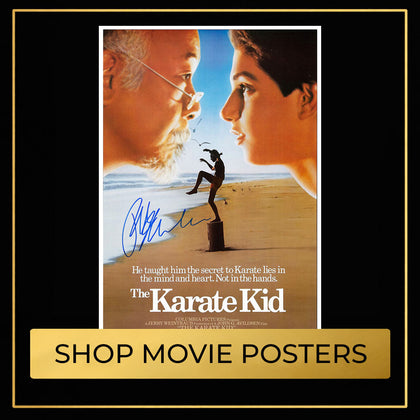 Signed movie posters collection featuring autographed entertainment memorabilia
