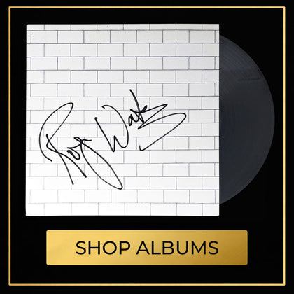 Signed music albums collection featuring autographed entertainment memorabilia