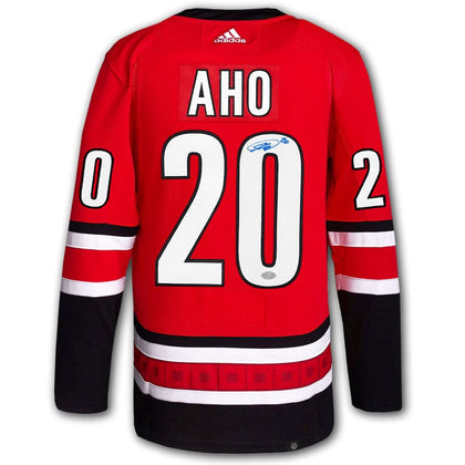Sebastian Aho Carolina Hurricanes Adidas Pro Jersey, autographed on the back, official NHL memorabilia for fans and collectors.