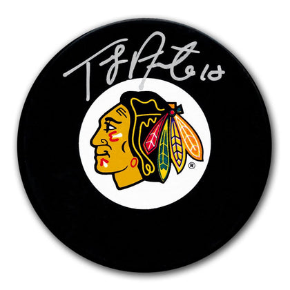 Tony Amonte Chicago Blackhawks signed hockey puck, featuring his autograph on the team logo—a must-have collectible for fans.