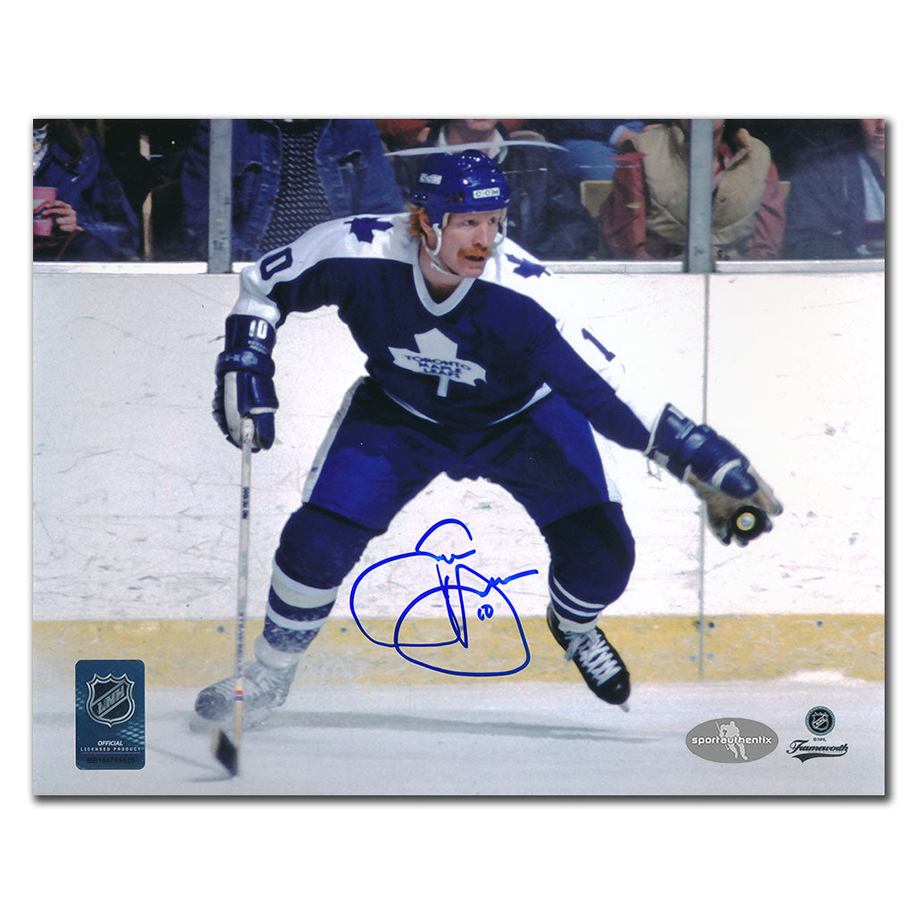 John Anderson autographed Toronto Maple Leafs 8x10 photo in blue jersey skating with puck