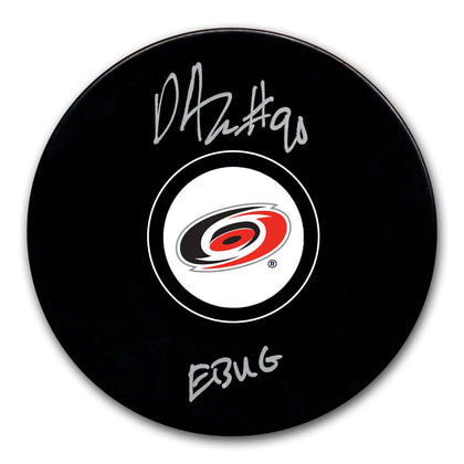 David Ayres autographed Carolina Hurricanes hockey puck, featuring EBUG inscription, COA, and bold Hurricanes team logo.