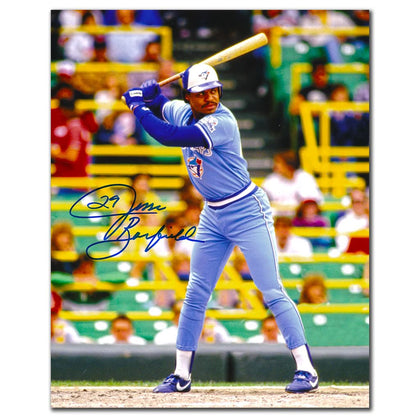 Autographed 8x10 photo of Jesse Barfield batting for the Blue Jays in a retro uniform, signature visible on the image.