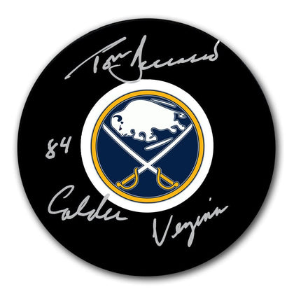 Tom Barrasso-signed Buffalo Sabres hockey puck featuring 1984 Calder & Vezina inscriptions—authentic sports memorabilia.
