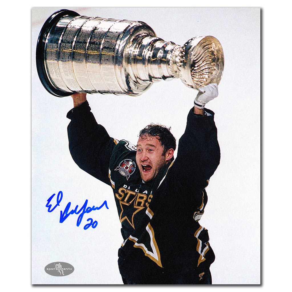 Ed Belfour autographed Dallas Stars 8x10 photo celebrating with the 1999 Stanley Cup
