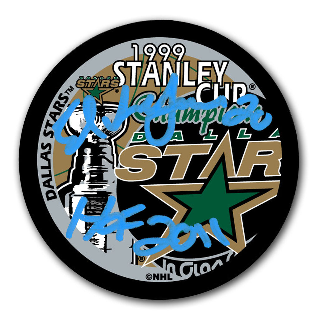 Ed Belfour autographed Dallas Stars 1999 Stanley Cup Champions hockey puck with HOF 2011 inscription
