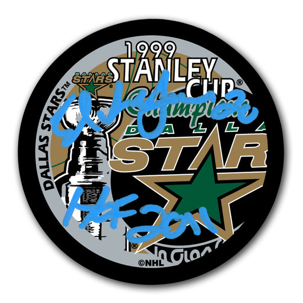 Ed Belfour autographed Dallas Stars 1999 Stanley Cup Champions hockey puck with HOF 2011 inscription