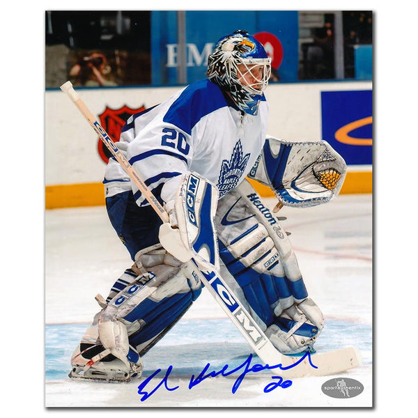 Ed Belfour autographed Toronto Maple Leafs 8x10 photo in white jersey game action