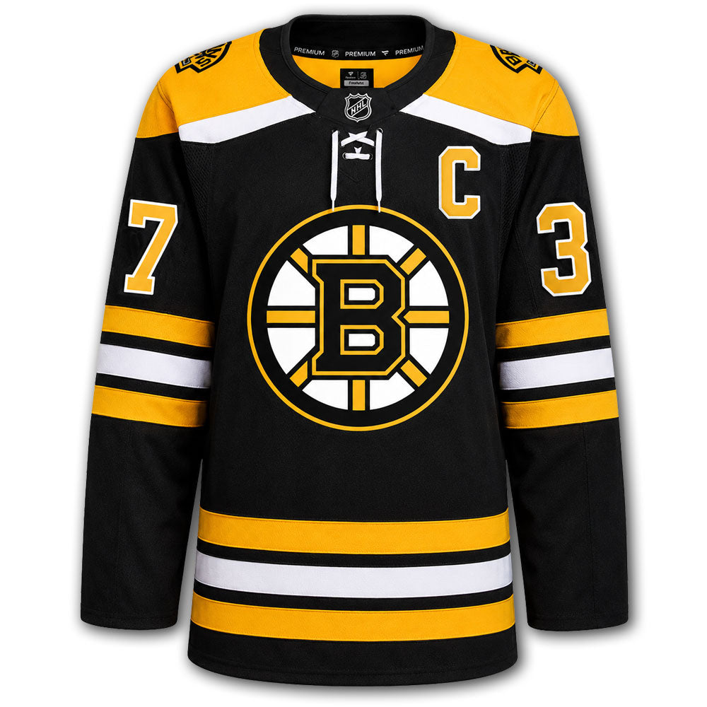 Patrice Bergeron autographed Boston Bruins Fanatics Premium jersey front with black home styling, captain C, Bruins crest and number 37 on the sleeves