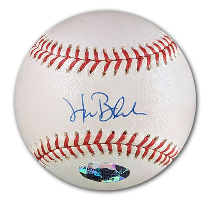 Hank Blalock signed official MLB baseball with visible autograph and authenticity sticker, perfect collectible sports memorabilia.