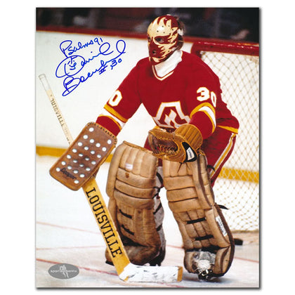 Dan Bouchard Atlanta Flames ACTION Autographed 8x10 photo, featuring his vintage red and yellow goalie gear, classic memorabilia.