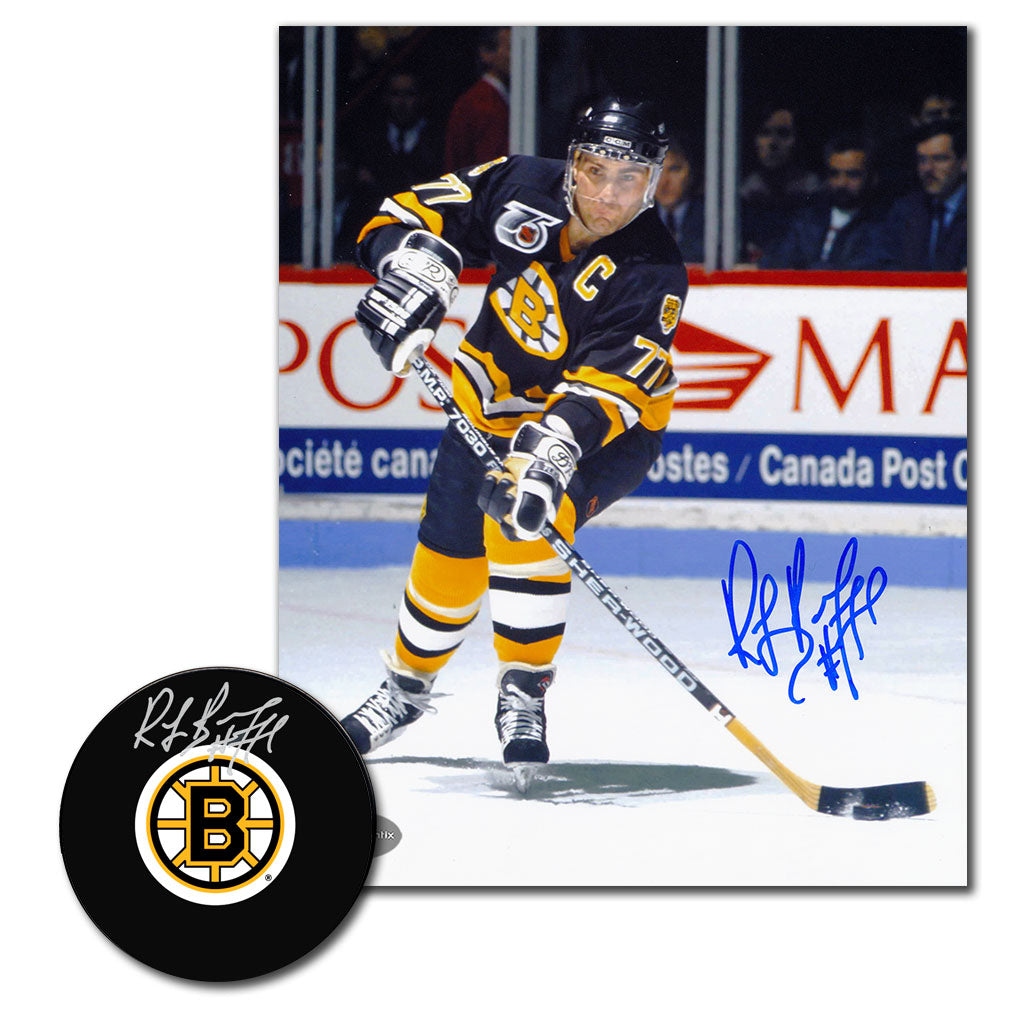 Ray Bourque autographed Boston Bruins hockey puck and 8x10 photo combo featuring Bruins game action and signed team logo puck