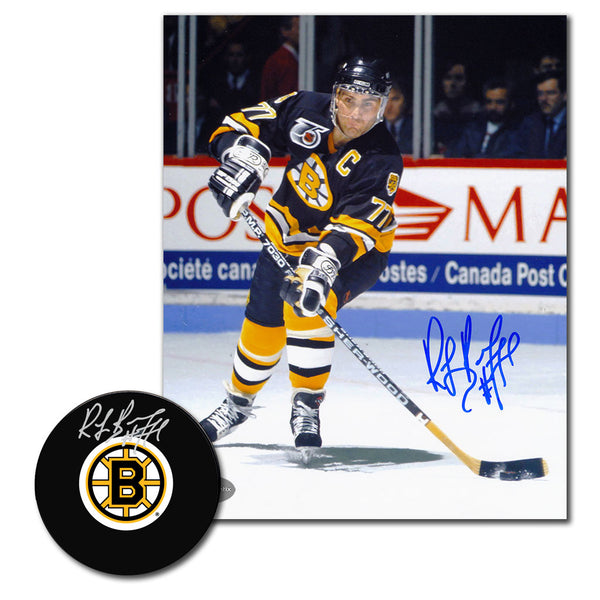Ray Bourque autographed Boston Bruins hockey puck and 8x10 photo combo featuring Bruins game action and signed team logo puck