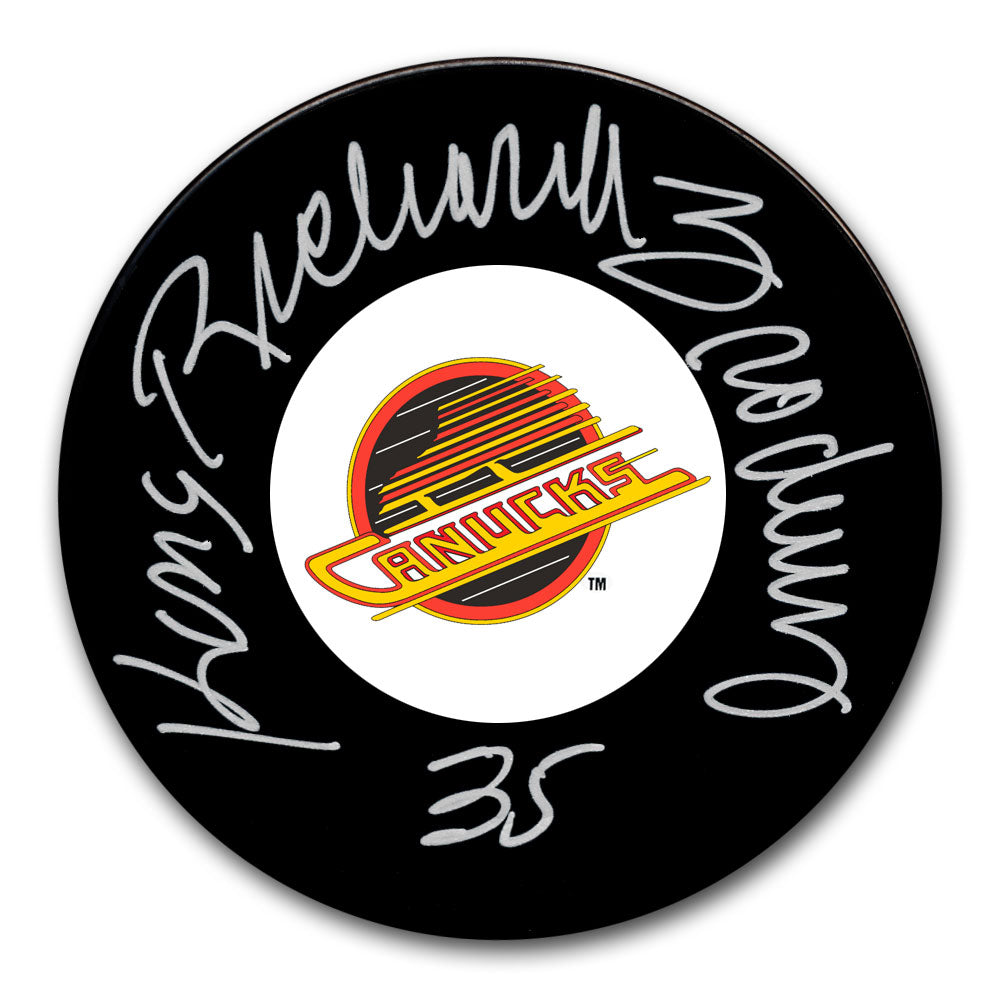 Richard Brodeur autographed Vancouver Canucks hockey puck