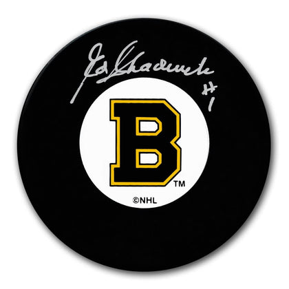 Ed Chadwick-signed Boston Bruins puck featuring the Original 6 B logo, includes a COA documenting the authenticated autograph.