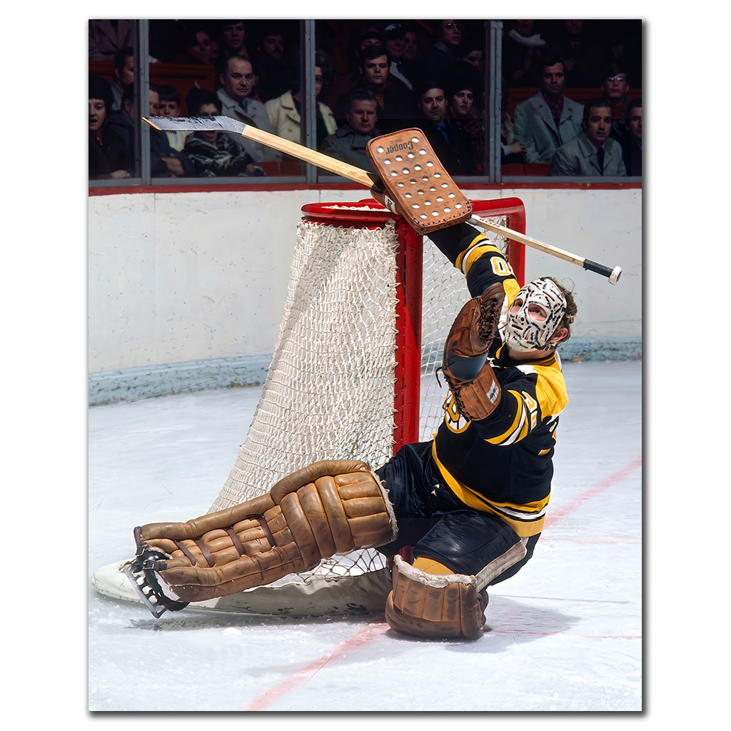 Gerry Cheevers Boston Bruins 8x10 hockey photo wearing his stitched goalie mask and black uniform while making a sprawling save for autograph pre-order