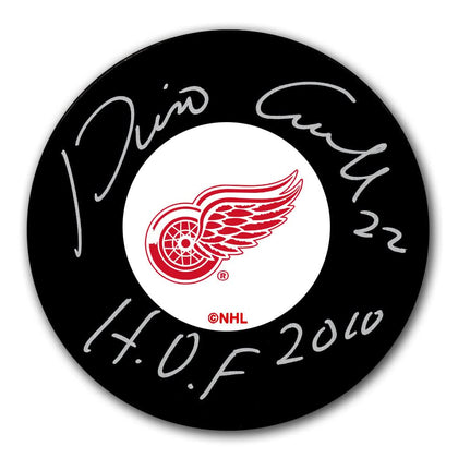 Dino Ciccarelli Detroit Red Wings Hall of Fame signed hockey puck, includes certificate of authenticity.