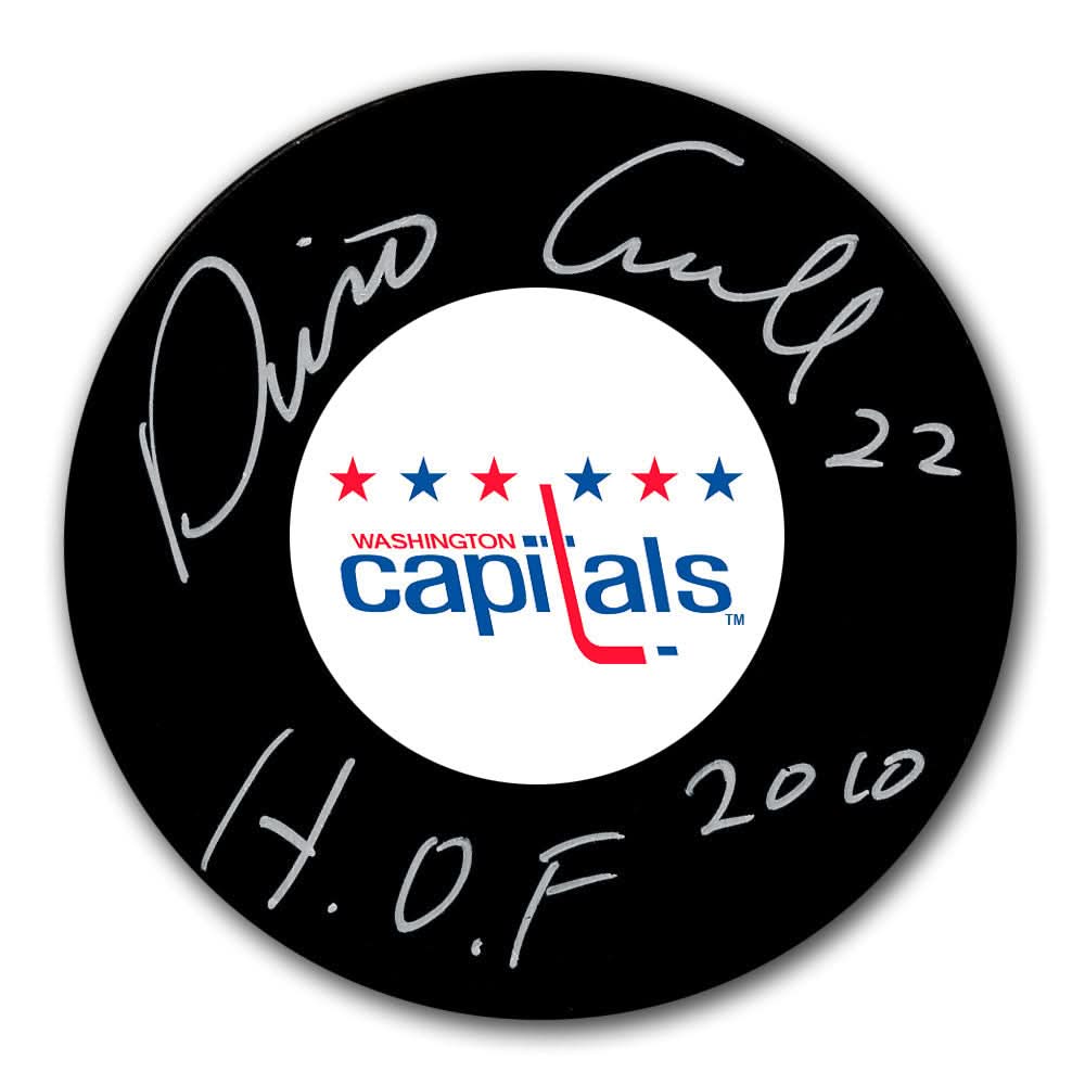 Official NHL Washington Capitals puck autographed by Dino Ciccarelli, inscribed 22 H.O.F 2010, includes COA.