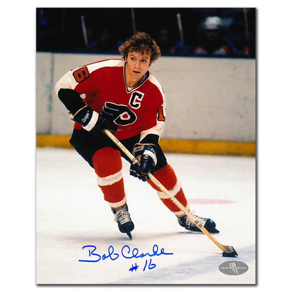 Bobby Clarke autographed Philadelphia Flyers 8x10 photo skating with the puck