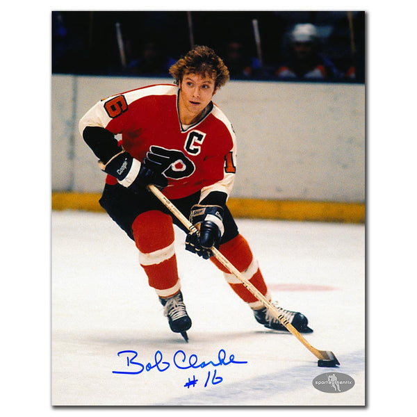 Bobby Clarke autographed Philadelphia Flyers 8x10 photo skating with the puck