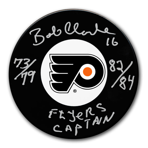 Bobby Clarke autographed Philadelphia Flyers hockey puck with Flyers Captain 73/79 and 82/84 inscriptions