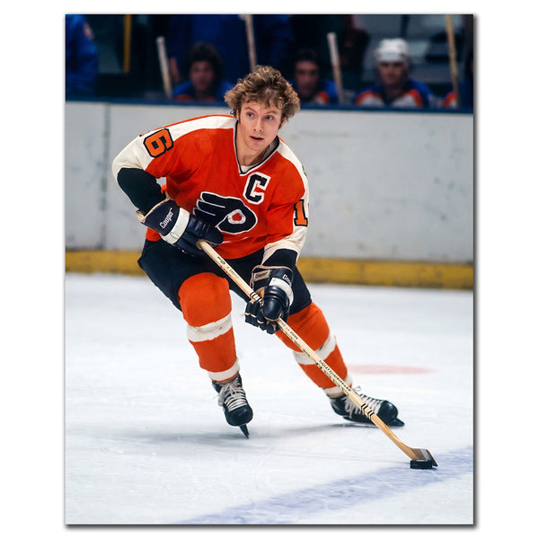 Bobby Clarke autographed Philadelphia Flyers 8x10 photo skating in orange jersey