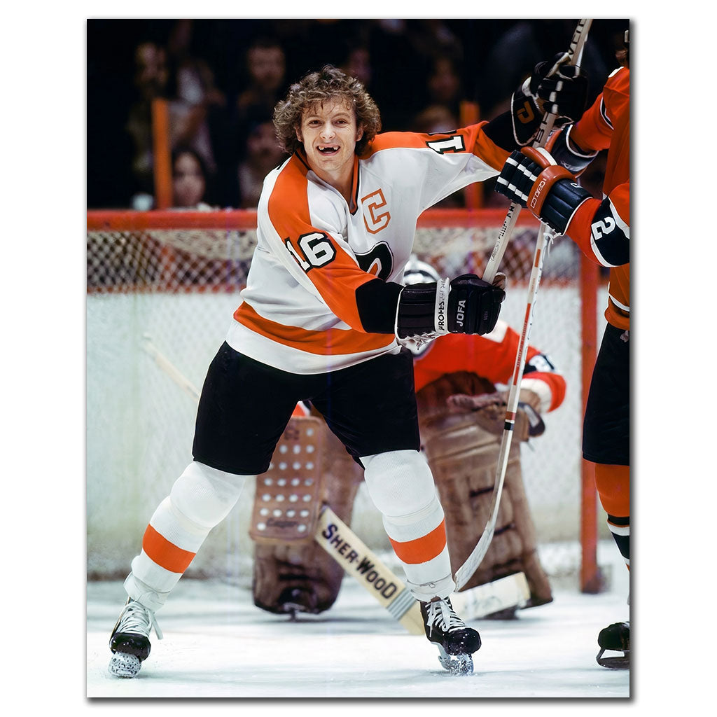 Bobby Clarke signed 8x10 photo in Philadelphia Flyers white uniform, featuring his autograph—perfect addition to Philadelphia Flyers memorabilia.