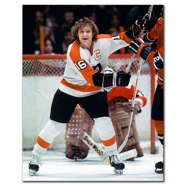 Bobby Clarke signed 8x10 photo in Philadelphia Flyers white uniform, featuring his autograph—perfect addition to Philadelphia Flyers memorabilia.