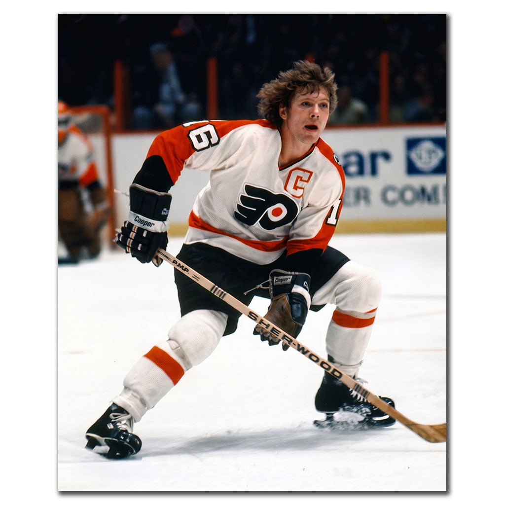 Bobby Clarke signed 16x20 photo in Philadelphia Flyers white uniform, featuring his autograph—perfect addition to Philadelphia Flyers memorabilia.