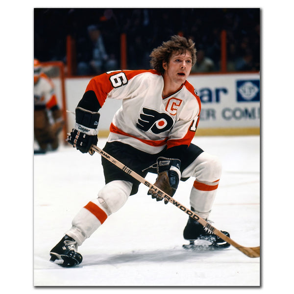 Bobby Clarke signed 16x20 photo in Philadelphia Flyers white uniform, featuring his autograph—perfect addition to Philadelphia Flyers memorabilia.