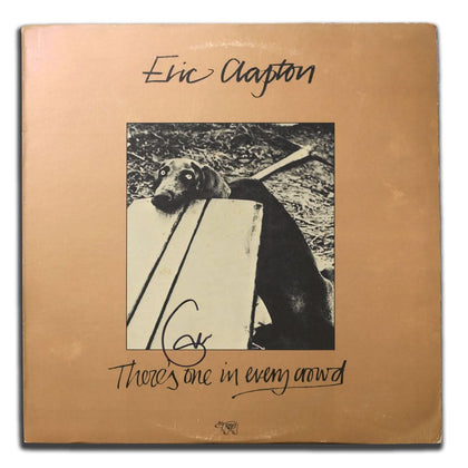 Eric Clapton autographed Theres One in Every Crowd vinyl LP featuring distinctive dog cover art, authenticated by JSA COA.