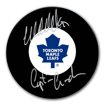 Wendel Clark Toronto Maple Leafs Captain Crunch signed puck, autographed in silver ink, authentic collectible hockey memorabilia.