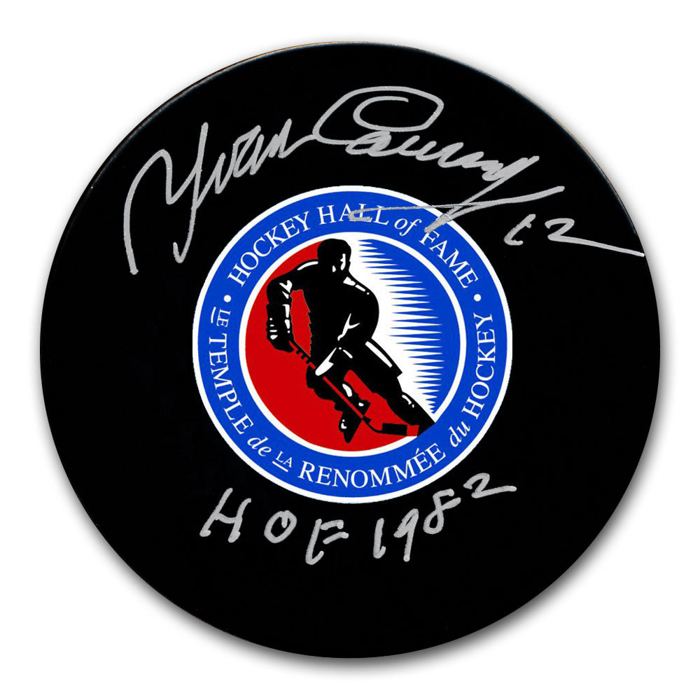Yvan Cournoyer autographed Hockey Hall of Fame puck with number 12 and HOF 1982 inscriptions