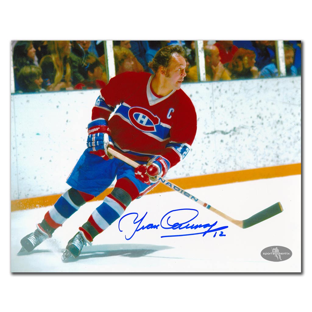 Yvan Cournoyer autographed Montreal Canadiens 8x10 red jersey skating photo