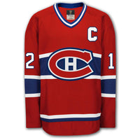 Yvan Cournoyer autographed Montreal Canadiens Fanatics Vintage Hockey jersey front with red home styling, captain C, Canadiens crest and number 12 on the sleeves