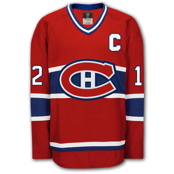 Yvan Cournoyer autographed Montreal Canadiens Fanatics Vintage Hockey jersey front with red home styling, captain C, Canadiens crest and number 12 on the sleeves