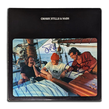 Autographed CSN vinyl LP featuring David Crosby, Stephen Stills & Graham Nash on a sailboat, with ACOA COA authentication.