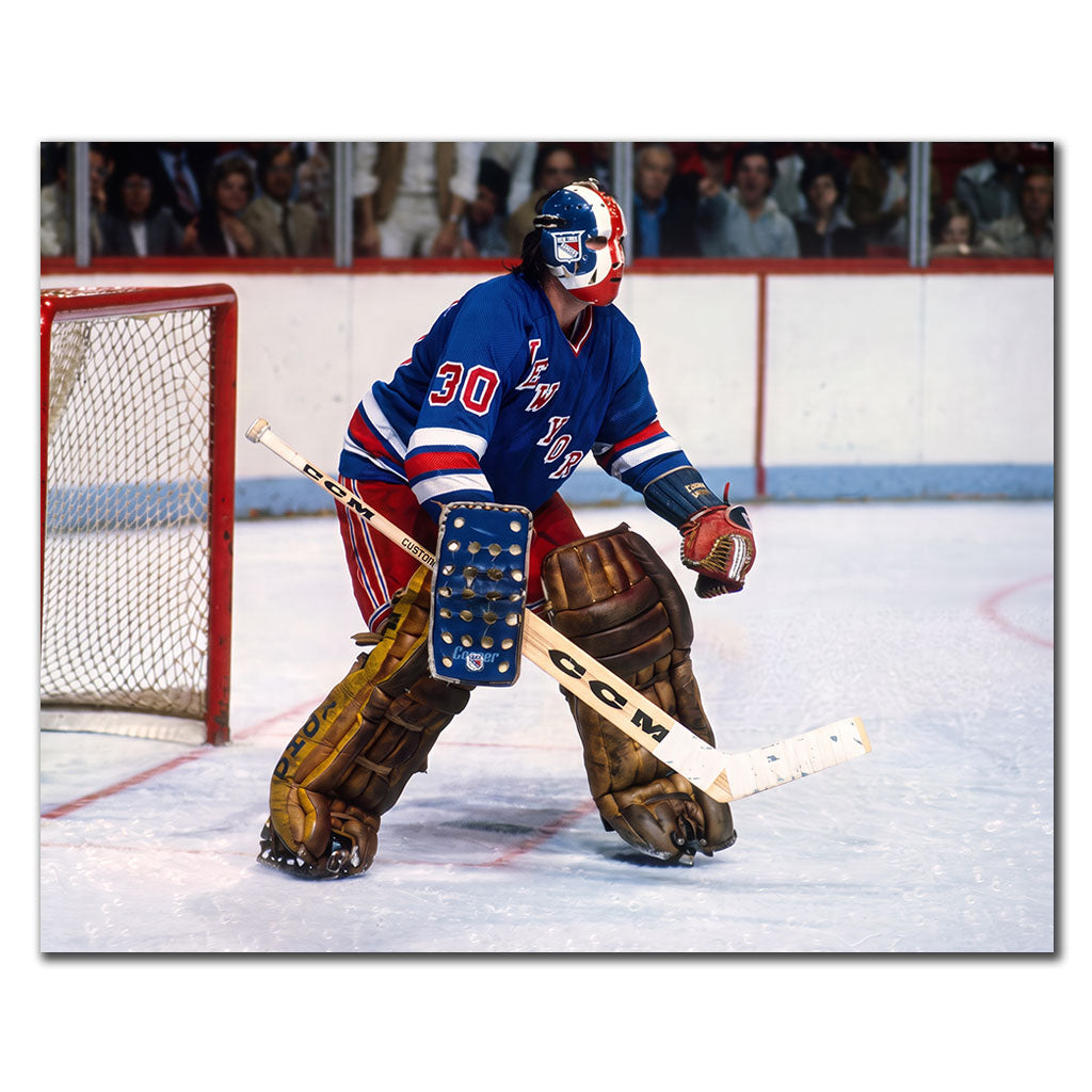 John Davidson New York Rangers 8x10 hockey photo wearing a white jersey and red, white and blue goalie mask while holding a ready stance beside the net for autograph pre-order