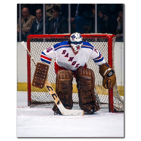 John Davidson New York Rangers 8x10 hockey photo wearing a white jersey and red, white and blue goalie mask while standing square to the play in front of the net for autograph pre-order