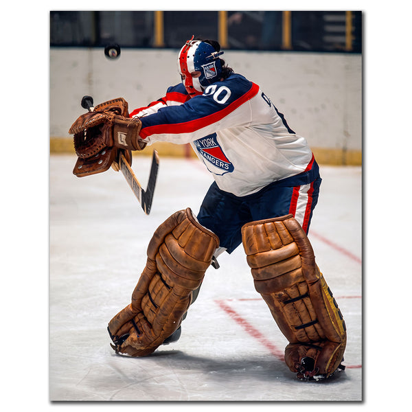 John Davidson New York Rangers 8x10 hockey photo wearing a white jersey and red, white and blue goalie mask while extending his catching glove toward the play for autograph pre-order
