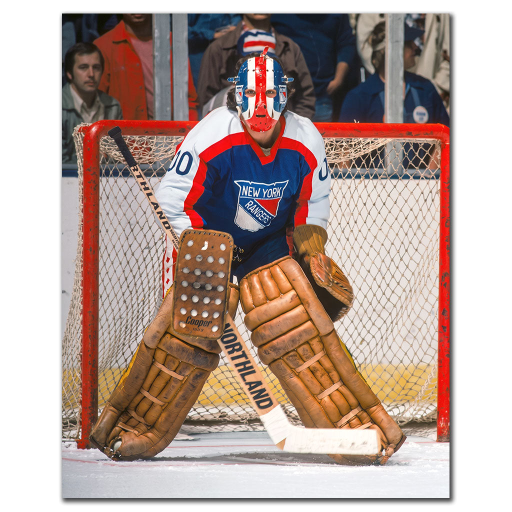 John Davidson New York Rangers 16x20 hockey photo wearing a blue, white and red jersey and vintage red, white and blue goalie mask while standing in front of the net for autograph pre-order