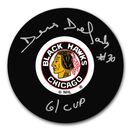 Denis Dejordy autographed hockey puck featuring the Chicago Blackhawks 1961 Cup logo, includes COA—a prized collectible.
