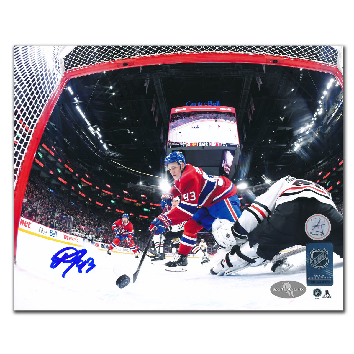 Ivan Demidov signed 8x10 Canadiens photo, inscribed with his first NHL goal, shows action from behind the net.