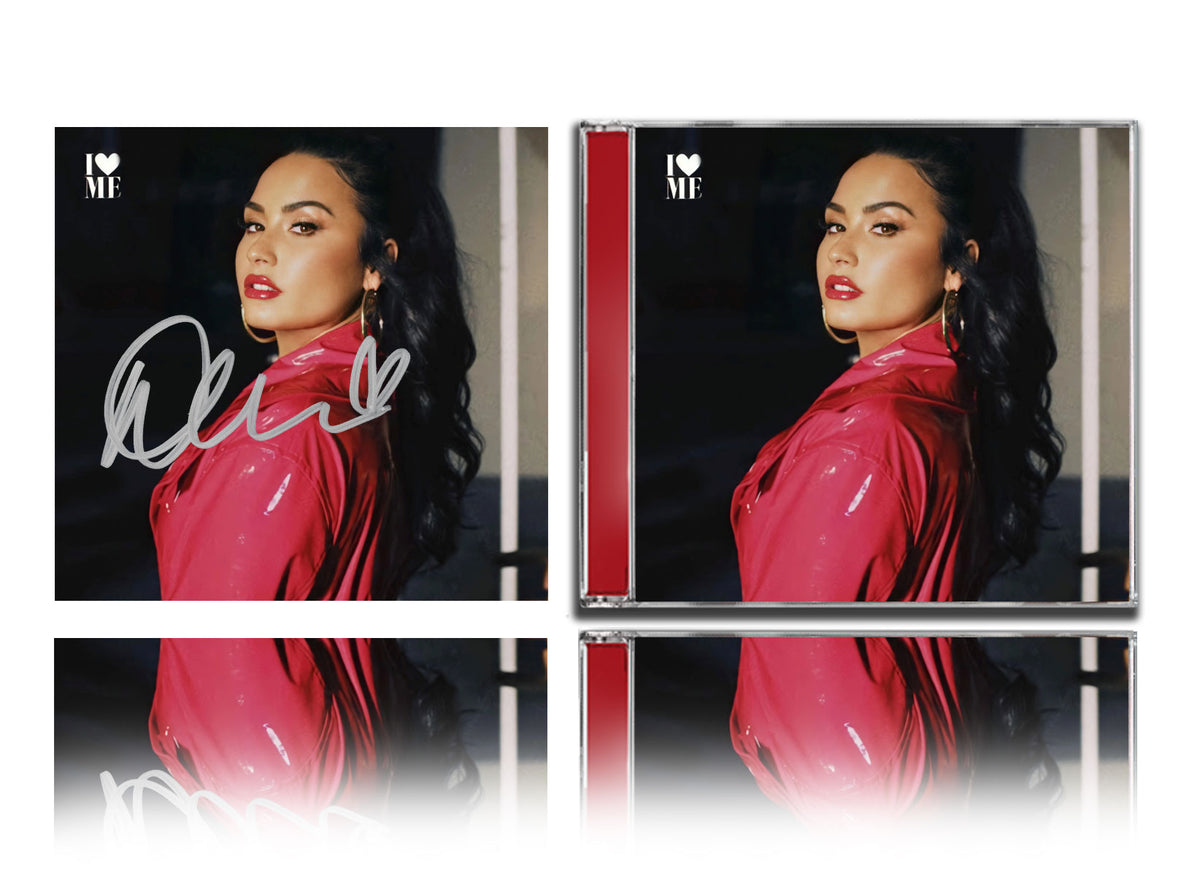 Demi Lovato a signé l'album CD dédicacé I LOVE ME
