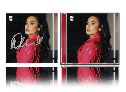 The Demi Lovato Signed I LOVE ME CD Album is a physical disc with a cover showing her in red, autographed and marked with a heart.