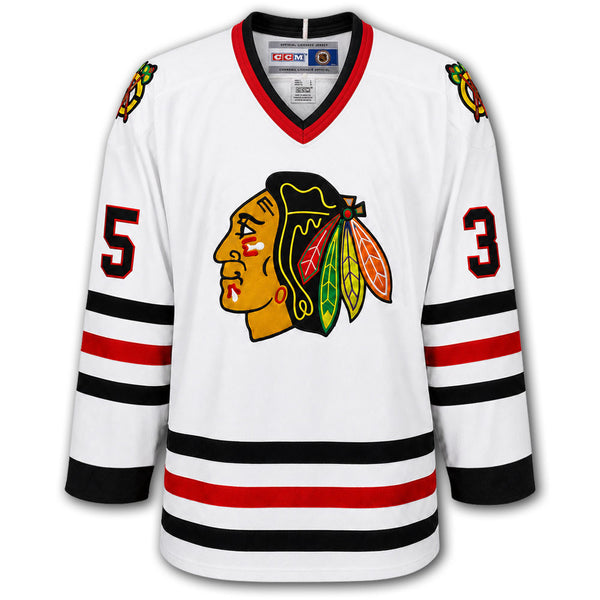 Tony Esposito autographed Chicago Blackhawks CCM jersey front with white road styling, Blackhawks crest, shoulder patches and number 35 on the sleeves